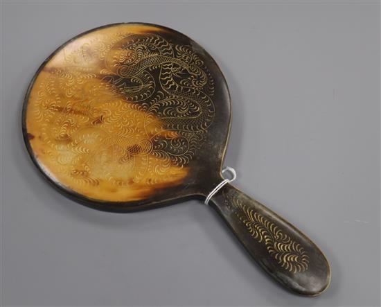 An Oriental tortoiseshell hand mirror length 27cm